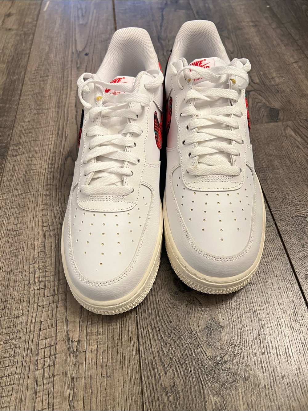 Nike Men’s White Sneakers with Red Swoosh